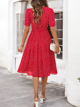 Liam - Vibrant printed summer dress with round neckline and short sleeves